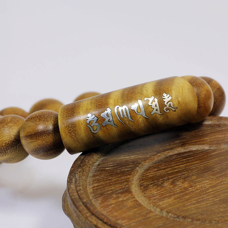 Bracelet mantra en six mots en bois de santal vert - Paix et protection · Sagesse