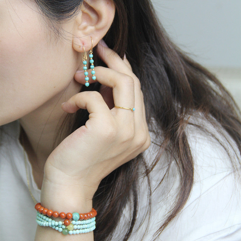Boucles d'oreilles en turquoise brute