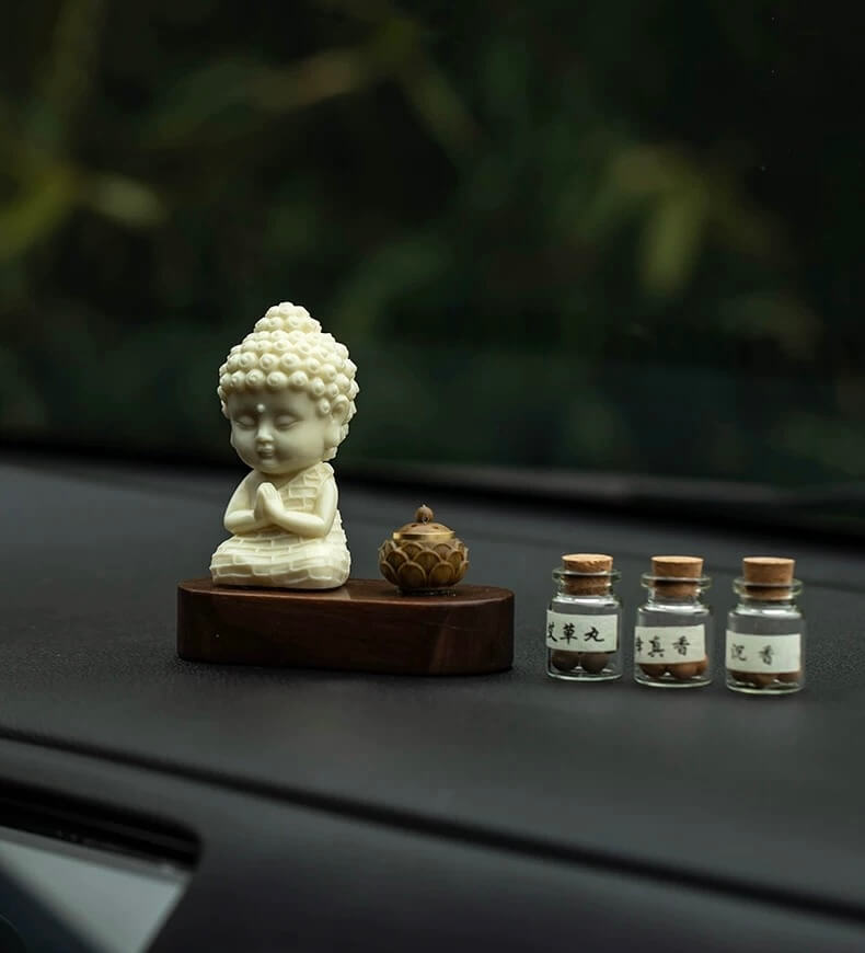 Mini diffuseur d'arômes pour voiture Buddha Ivory Nut - Paix et protection