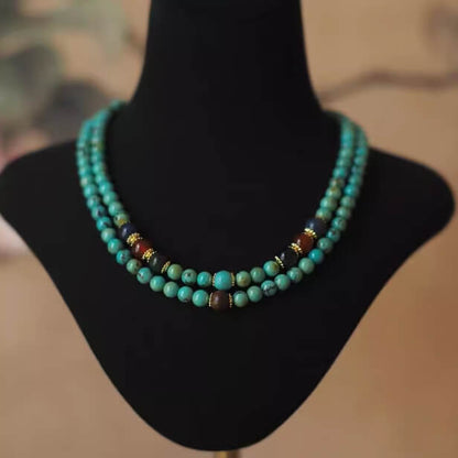Collier vintage en bois de santal turquoise - Libération • Calme • Harmonie
